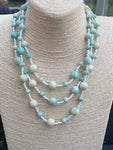 Vintage triple row glass “Eau de Nil” beads necklace.