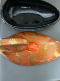 Japanese red papier-mâché duck with gold storks